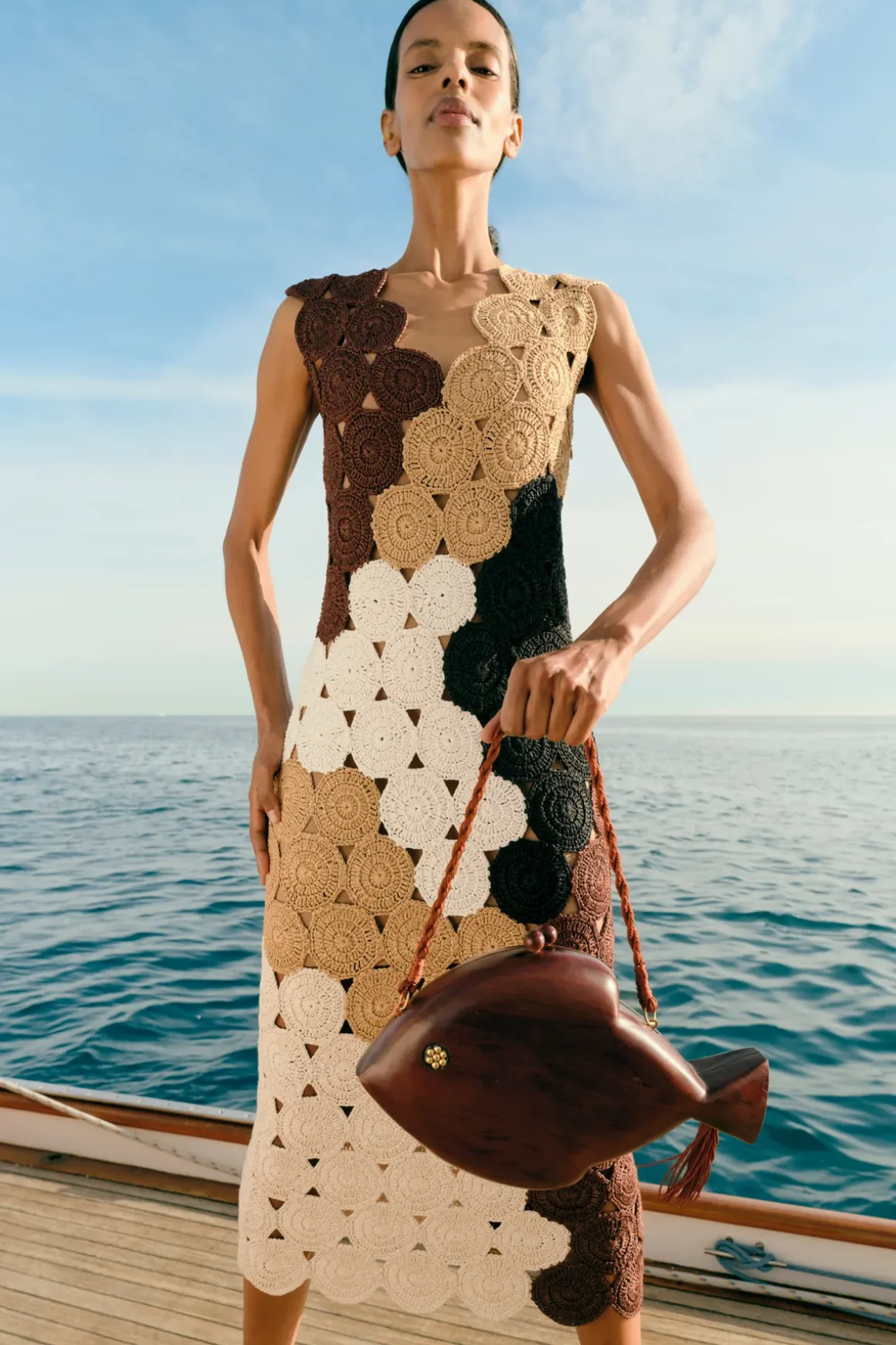 Carvedcarved wooden fish clutch